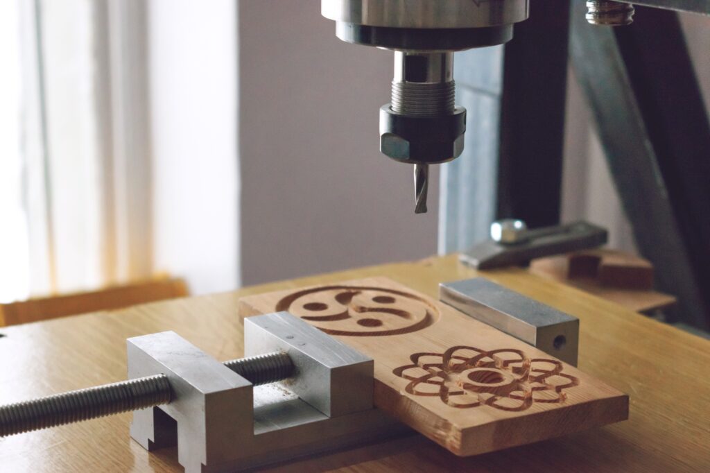 wood cutting machine 3D wood cnc router. CNC milling machine carving a wooden part blank. Cutter